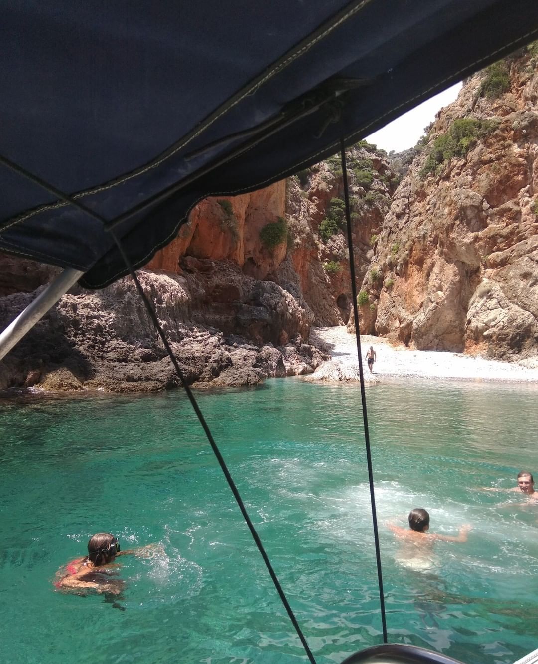 Rent a boat and visit the secret beaches of Crete
